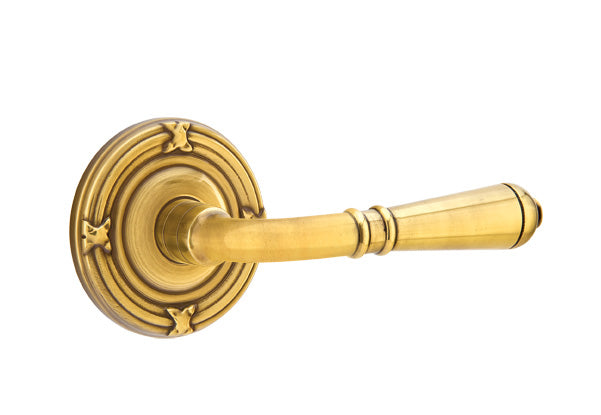 Emtek Door Handle - Turino Lever Ribbon & Reed Rosette - Classic Brass