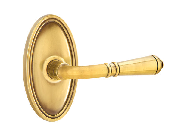 Emtek Door Handle - Turino Lever Oval Rosette - Classic Brass